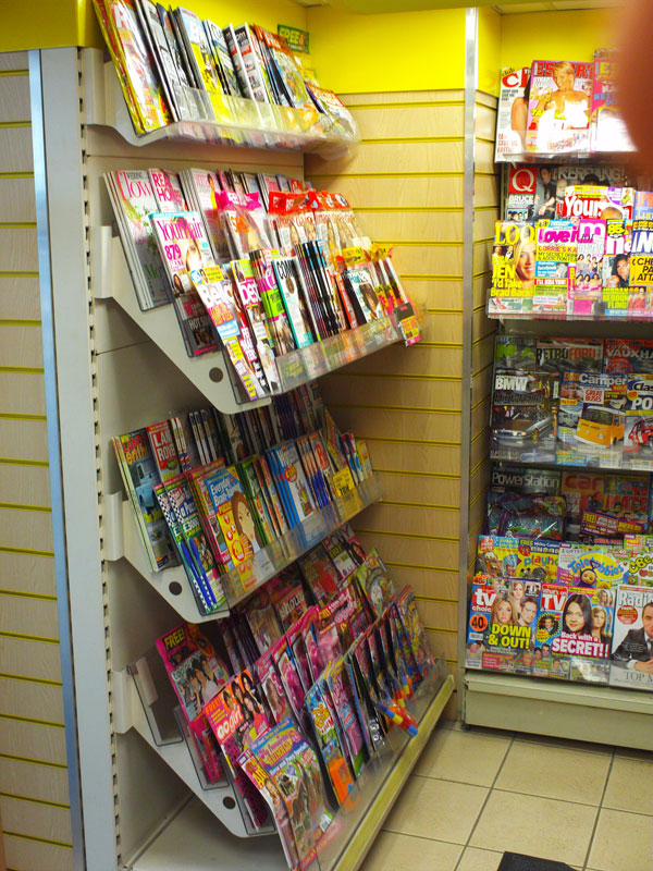 Magazine shelving unit in store