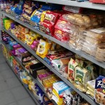 Silver Gondola Shelving in Convenience Store